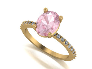 Image of a dainty oval solitaire engagement ring encrusted with side stones